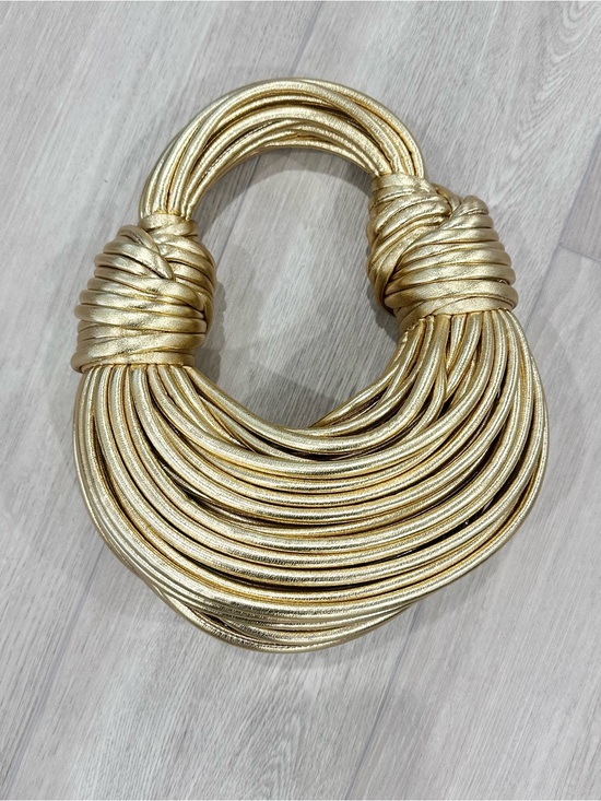 Bottega Veneta Handbags - NWOT BOTTEGA VENETA leather double knot tubular mini spaghetti bag clutch gold
